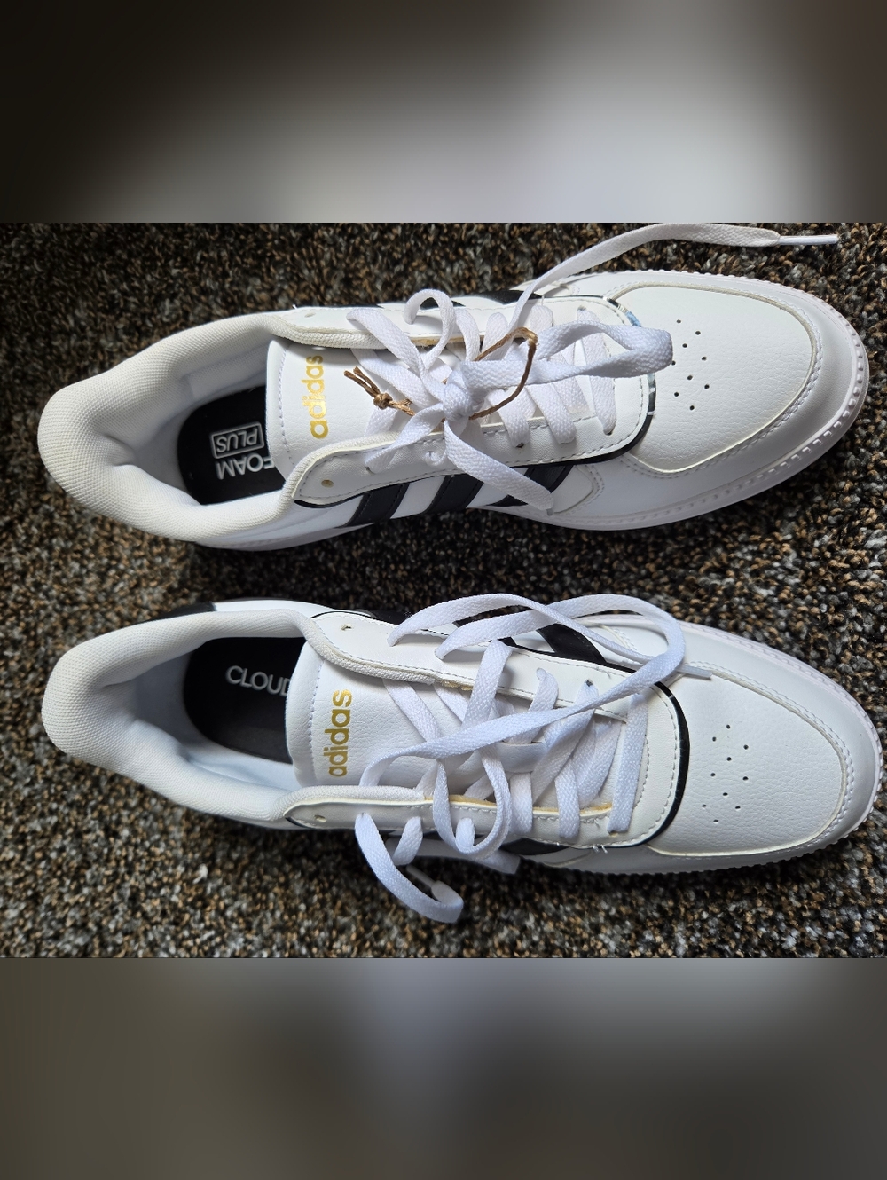 adidas Women’s White Sneakers with Black Stripes and Gold Accents